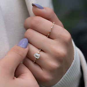 The Penelope Set With A 4.5 Carat Emerald Moissanite