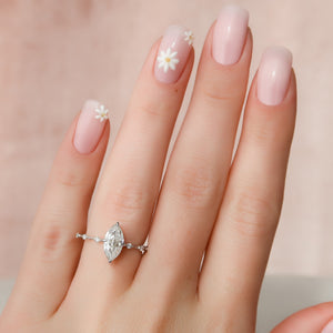 The Penelope Set With A 4.5 Carat Marquise Moissanite