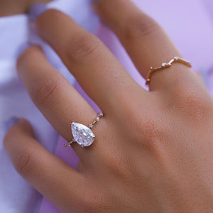 The Hidden Halo Penelope Set With A 4.5 Carat Pear Moissanite