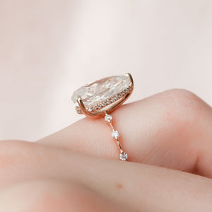 The Hidden Halo Penelope Set With A 4.5 Carat Pear Moissanite