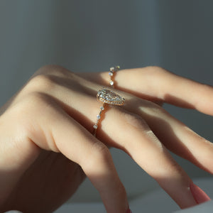 The Hidden Halo Penelope Set With A 4.5 Carat Pear Moissanite