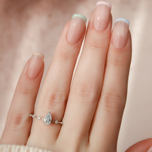 The Hidden Halo Penelope Set With A Pear Moissanite