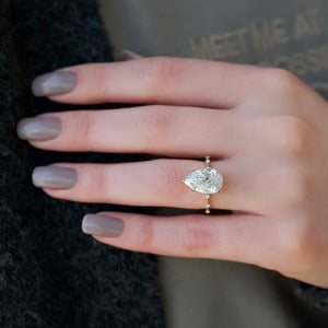 The Penelope Set With A 1.5 Carat Pear Moissanite