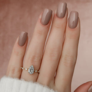 The Penelope Set With A 1.5 Carat Pear Moissanite