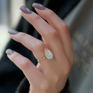 The Penelope Set With A 1.5 Carat Pear Moissanite