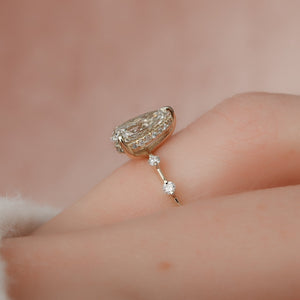 The Penelope Set With A 1.5 Carat Pear Moissanite