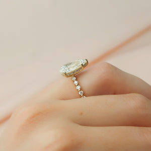 The Khloe Set With A 1.5 Carat Pear Moissanite
