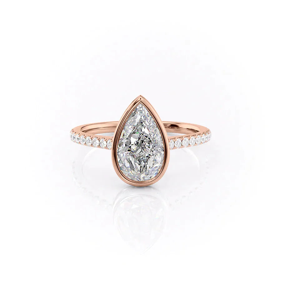 The Pave Charlotte Set With A 1.5 Carat Pear Moissanite