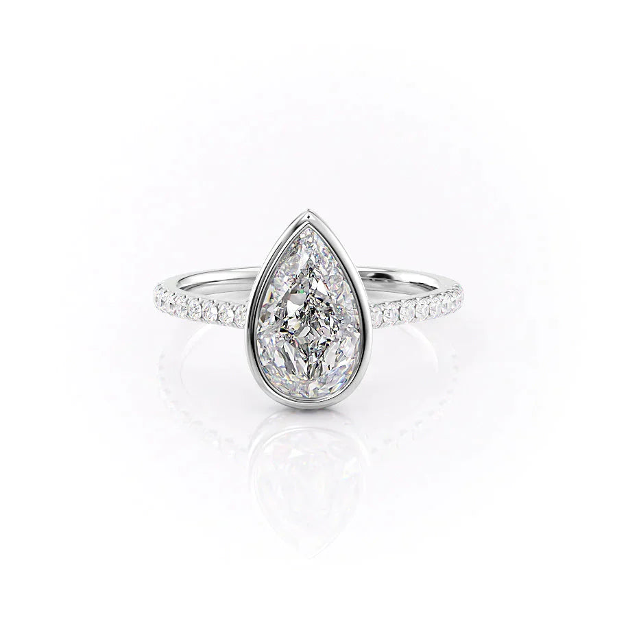 The Pave Charlotte Set With A 1.5 Carat Pear Moissanite