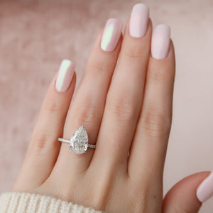 The Pave Alex Set With A Pear Moissanite