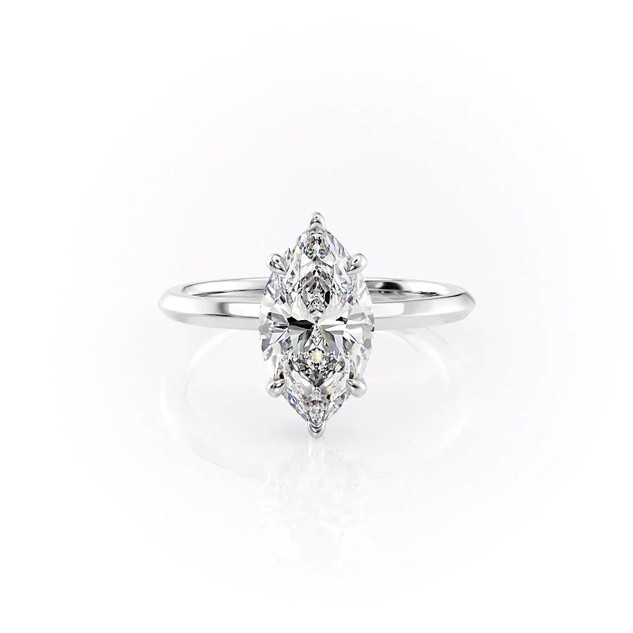 The Razor Kamellie Set With A 1.5 Carat Marquise Moissanite