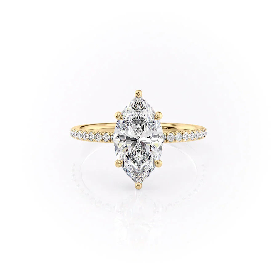 The Low Profile Kamellie Set With A 1.5 Carat Marquise Moissanite