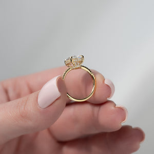 The Low Profile Kamellie Set With A 1.5 Carat Oval Moissanite