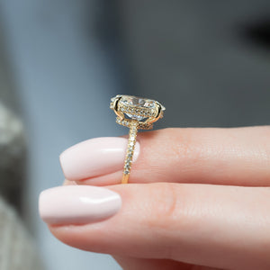 The Low Profile Kamellie Set With A 1.5 Carat Oval Moissanite