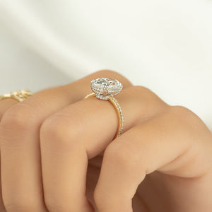 The Low Profile Kamellie Set With A 1.5 Carat Oval Moissanite