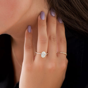 The Low Profile Kamellie Set With A 1.5 Carat Oval Moissanite