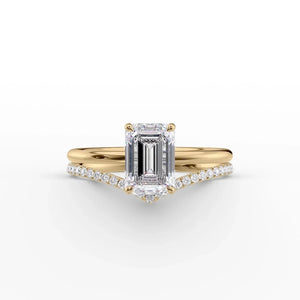 The Low Profile Kamellie Set With A 2.5 Carat Emerald Moissanite