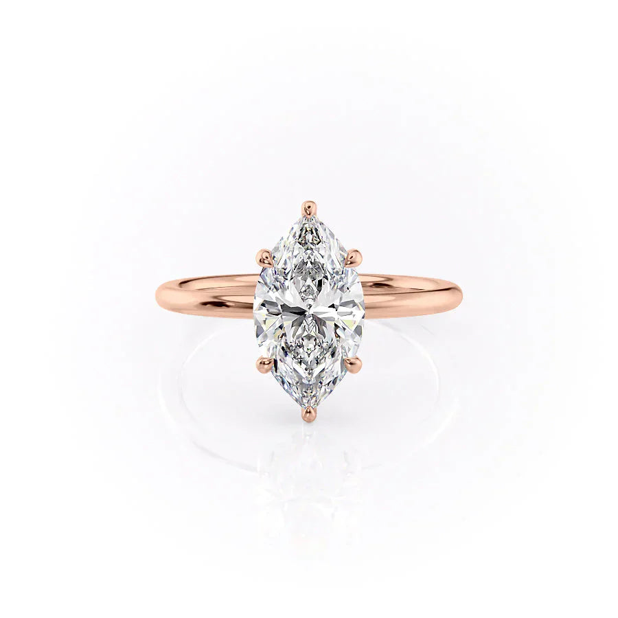 The Low Profile Kamellie Set With A 1.5 Carat Marquise Moissanite