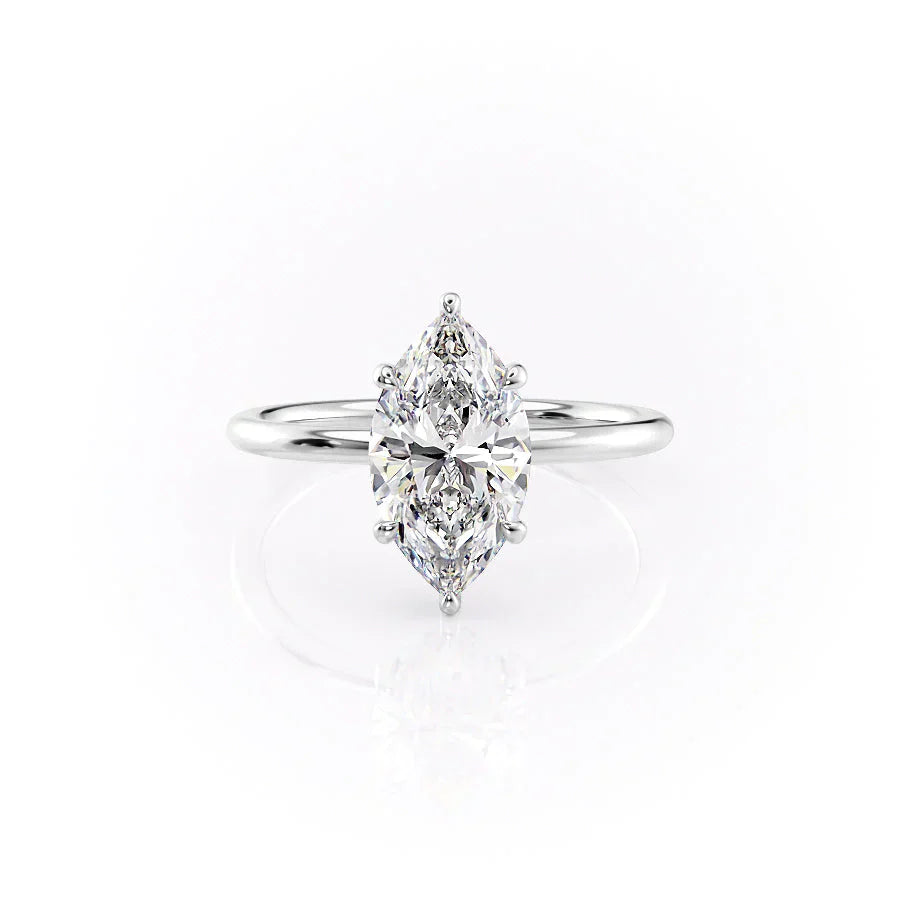 The Low Profile Kamellie Set With A 1.5 Carat Marquise Moissanite
