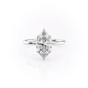 The Low Profile Kamellie Set With A 1.5 Carat Marquise Moissanite