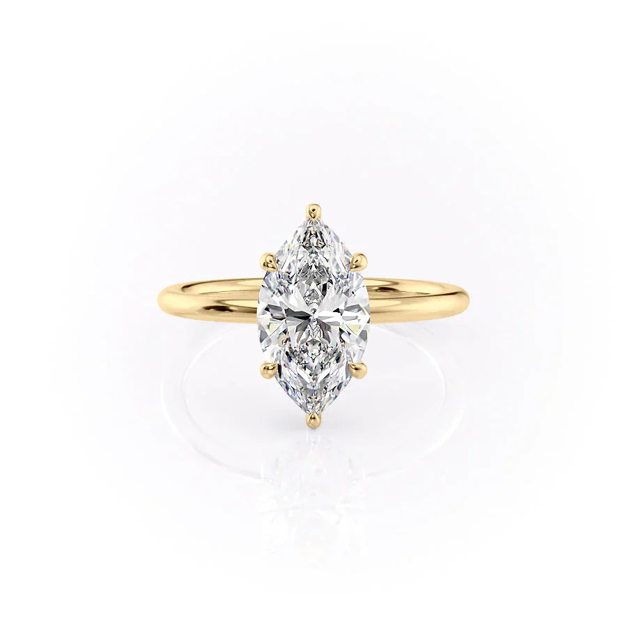 The Low Profile Kamellie Set With A 1.5 Carat Marquise Moissanite