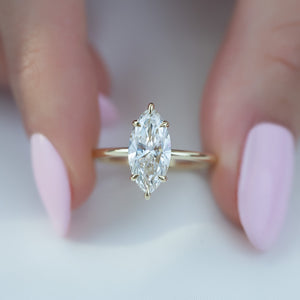 The Low Profile Kamellie Set With A 1.5 Carat Marquise Lab Diamond