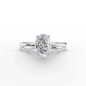 The Low Profile Kamellie Set With A 1.5 Carat Oval Moissanite