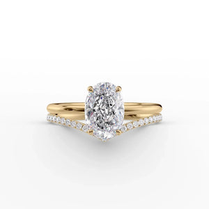 The Low Profile Kamellie Set With A 1.5 Carat Oval Lab Diamond