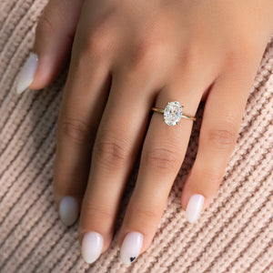 The Low Profile Kamellie Set With A Oval Moissanite