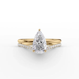 The Low Profile Kamellie Set With A 2.5 Carat Pear Moissanite