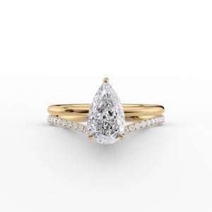 The Low Profile Kamellie Set With A Pear Moissanite