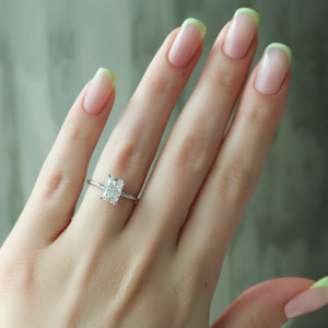 The Low Profile Kamellie Set With A 2.5 Carat Radiant Moissanite