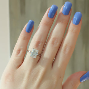 The Low Profile Kamellie Set With A 2.5 Carat Radiant Moissanite