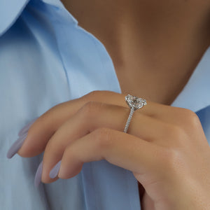 The Pave Claire Set With A 1.5 Carat Oval Lab Diamond