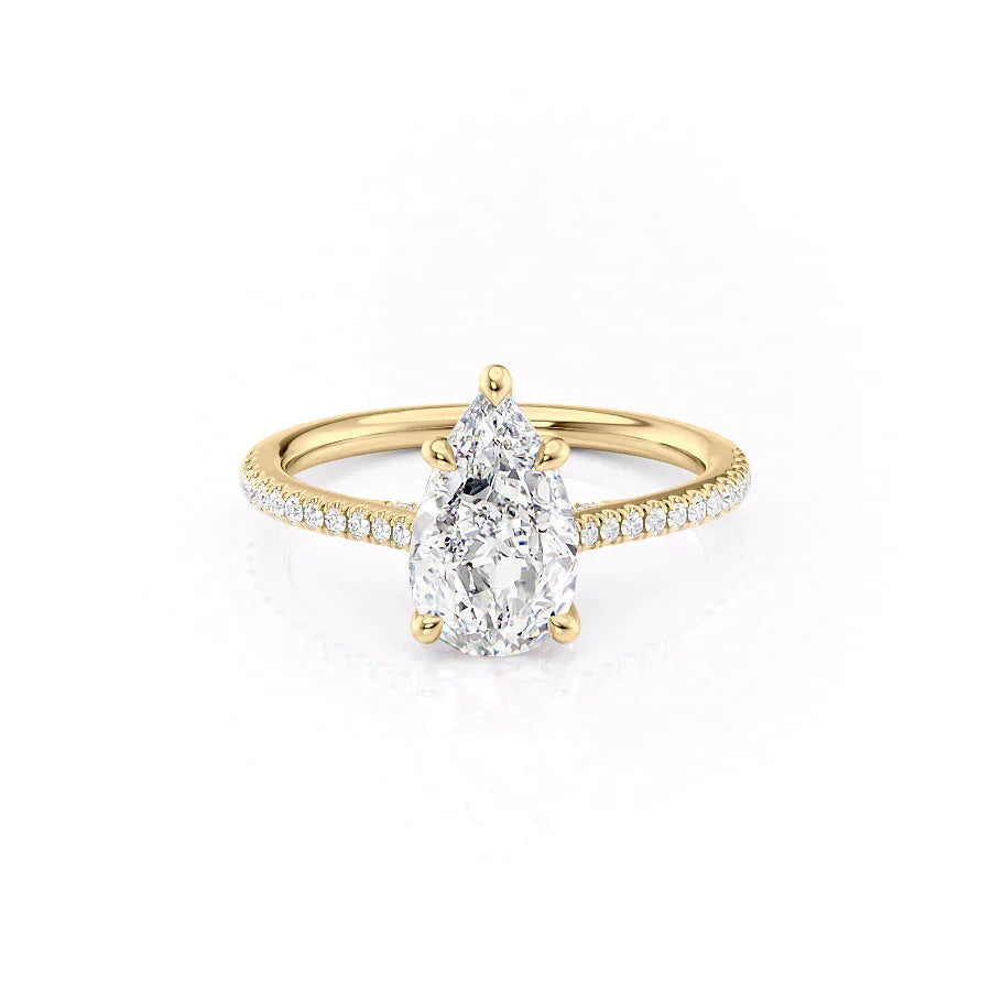The Pave Claire Set With A 1.5 Carat Pear Moissanite