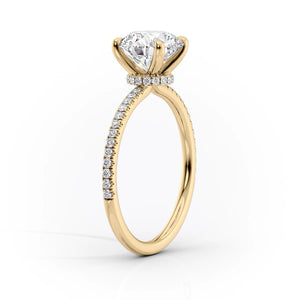 The Pave Nelly Set With A 1.5 Carat Emerald Moissanite