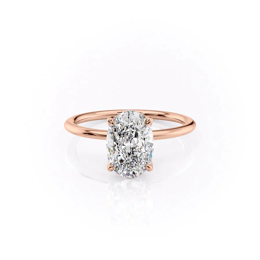 The Petal Kamellie Set With A 1.5 Carat Oval Moissanite