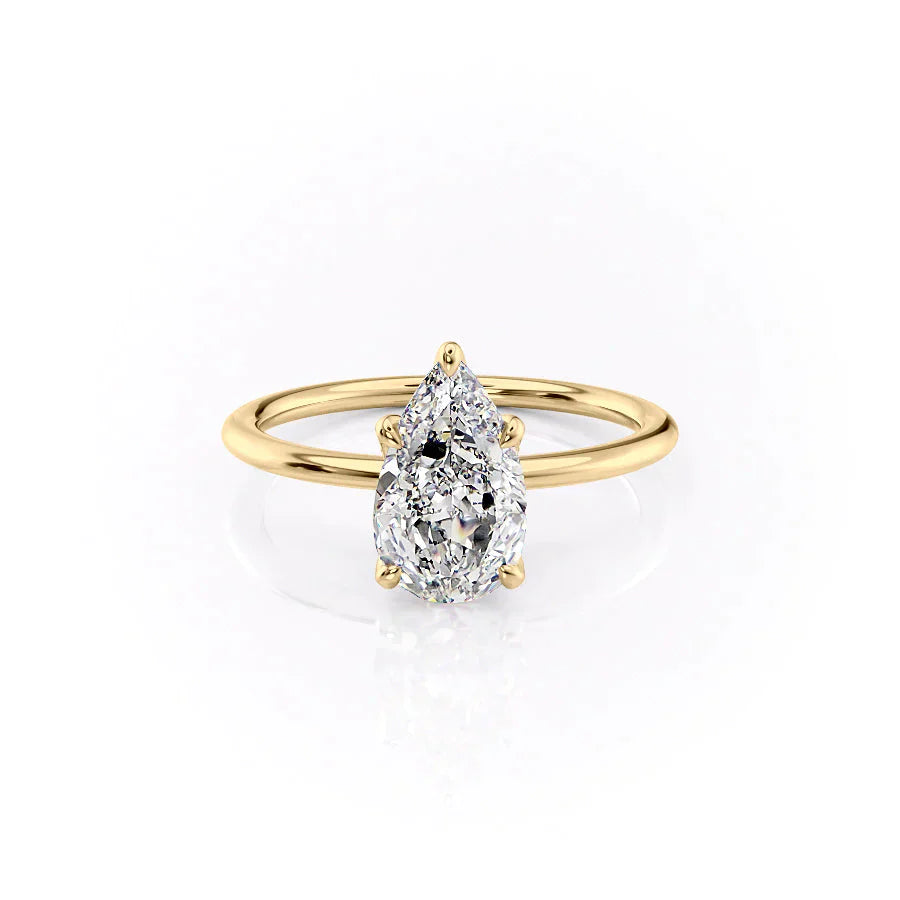 The Petal Kamellie Set With A 1.5 Carat Pear Moissanite