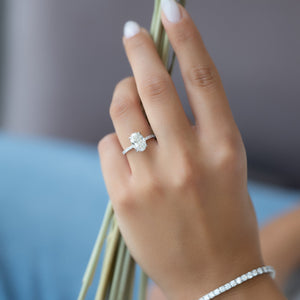 The Pave Petal Kamellie Set With A 2.5 Carat Oval Lab Diamond