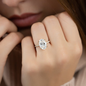 The Pave Petal Kamellie Set With A Oval Moissanite