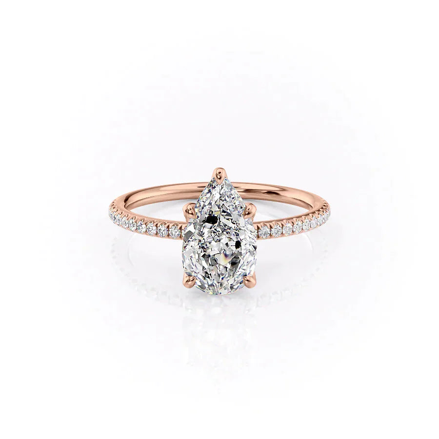 The Pave Petal Kamellie Set With A 2.5 Carat Pear Moissanite