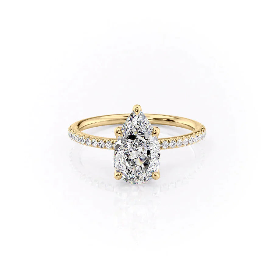 The Pave Petal Kamellie Set With A 5 Carat Pear Moissanite