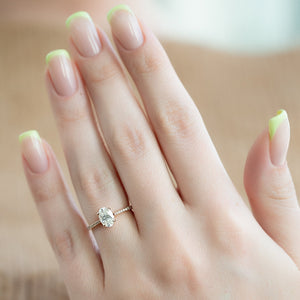 The Pave Lexie Set With A 4.5 Carat Oval Moissanite