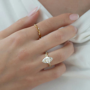 The Pave Twig Set With A 1.5 Carat Marquise Moissanite