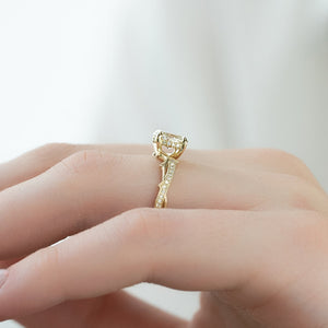 The Pave Twig Set With A 2.5 Carat Oval Lab Diamond