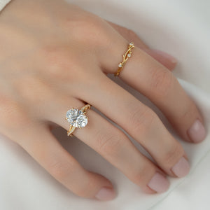 The Pave Twig Set With A 2.5 Carat Oval Lab Diamond