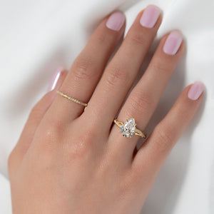 The Pave Twig Set With A Pear Moissanite