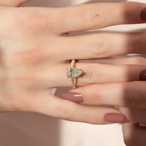The Pave Twig Set With A Pear Moissanite