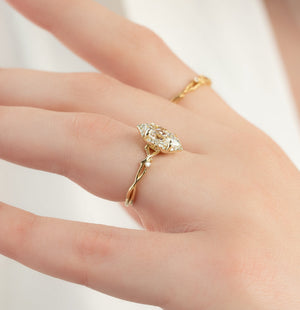 The Halo Twig Set With A Marquise Moissanite