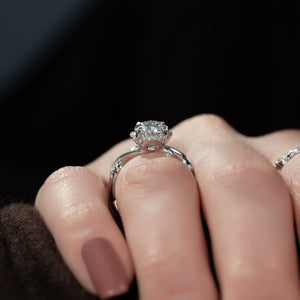 The Halo Twig Set With A 1.5 Carat Oval Lab Diamond